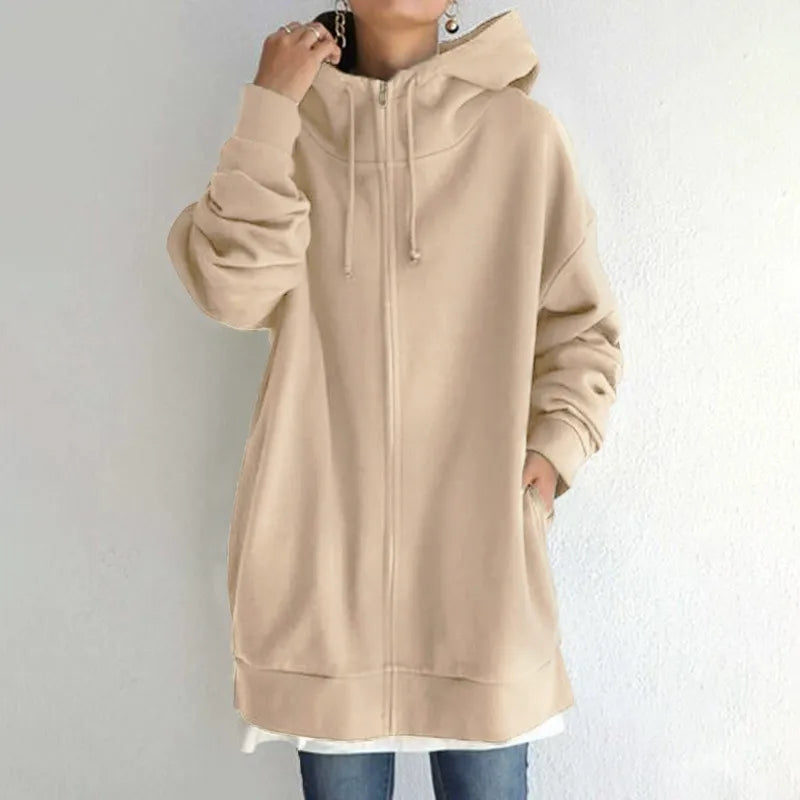 Women's oversized fleece-lined zip-up hoodie in urban streetwear style with cozy relaxed silhouette