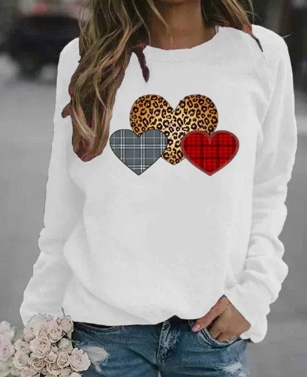 Women's loose fit cotton blend sweatshirt in neutral tone with playful center-front heart graphic print