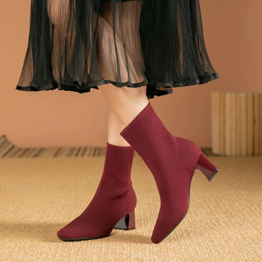 Women's ribbed knit ankle boots in neutral tone, cozy insulated winter style with snug flexible fit