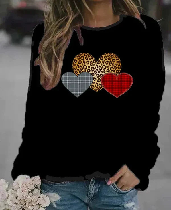 Women's loose fit cotton blend sweatshirt in neutral tone with playful center-front heart graphic print