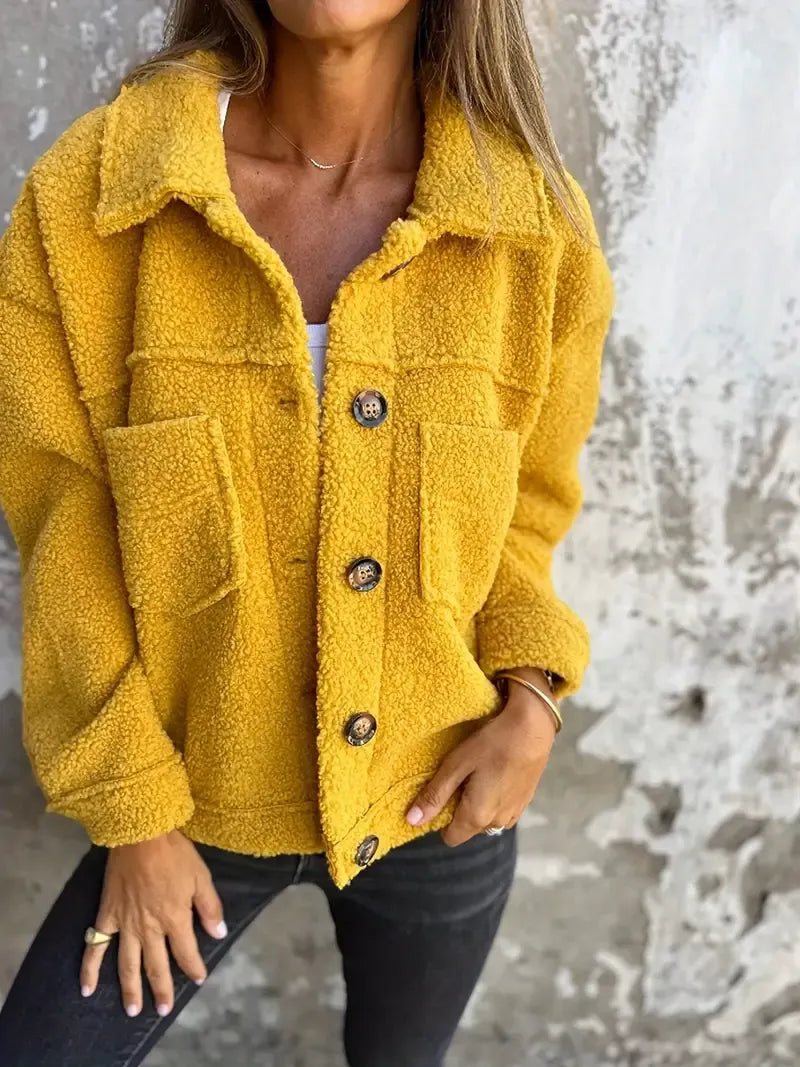 Women's oversized teddy texture jacket in cozy relaxed fit with button closure, casual warm style