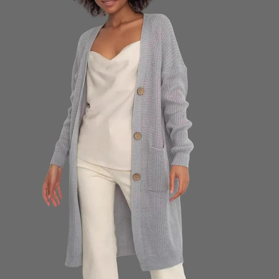 Women's long relaxed-fit soft knit cardigan with button closure and side pockets for effortless layering