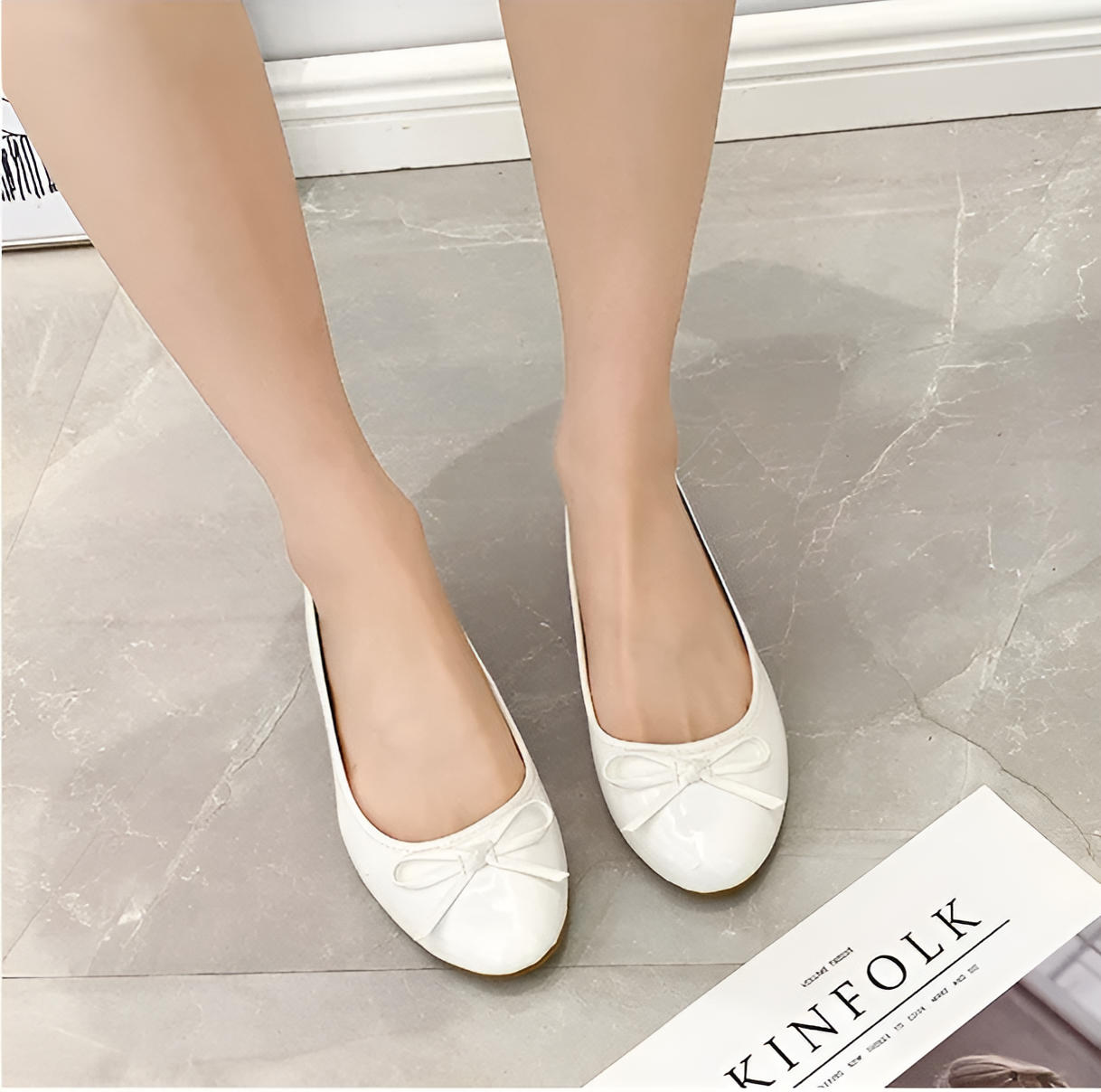 Tan leather ballet flats with arch support, polished professional cut for all-day office comfort