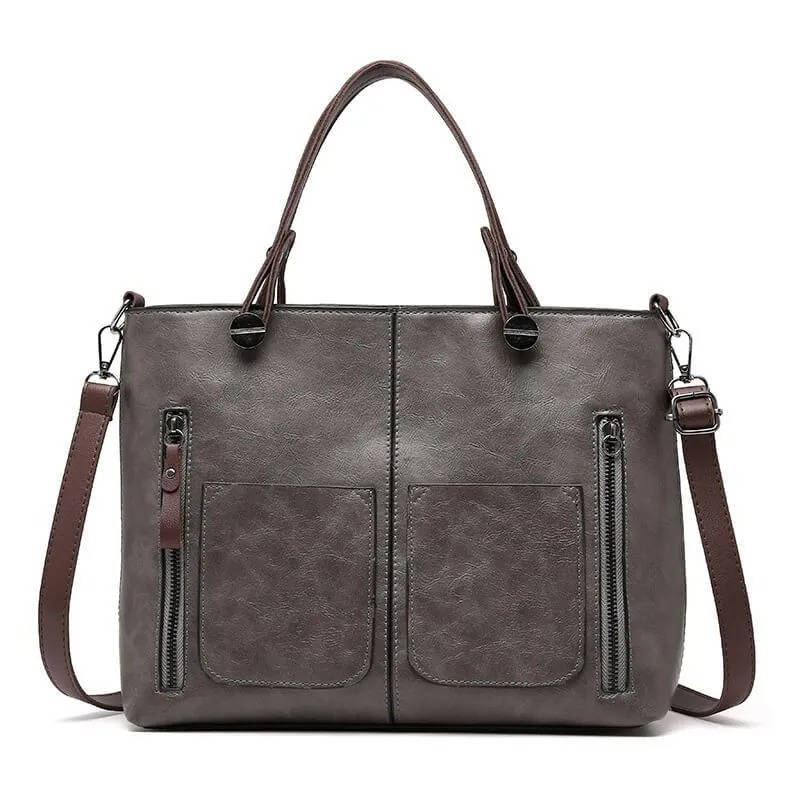 Vintage-style brown PU leather handbag with shoulder strap, structured silhouette for work and travel