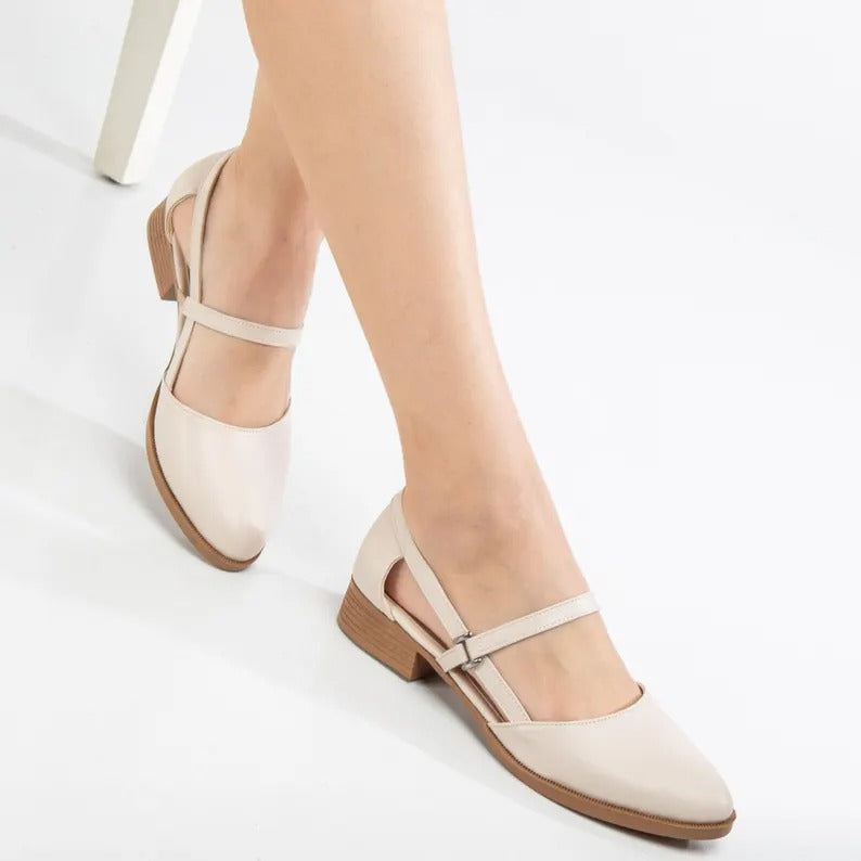 Beige vegan leather Mary Jane heels with secure ankle strap and comfort block heel