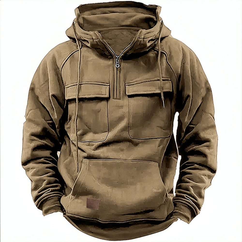 Men's relaxed fit half-zip hoodie with chest pockets in casual urban streetwear style