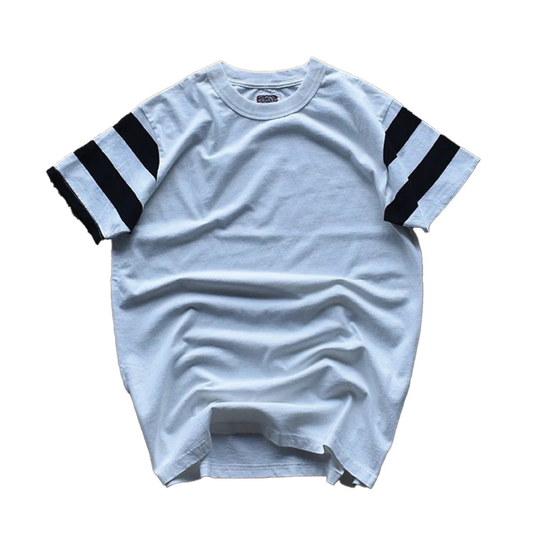 Striped relaxed-fit cotton tee with bold contrast double-striped sleeves for collegiate streetwear