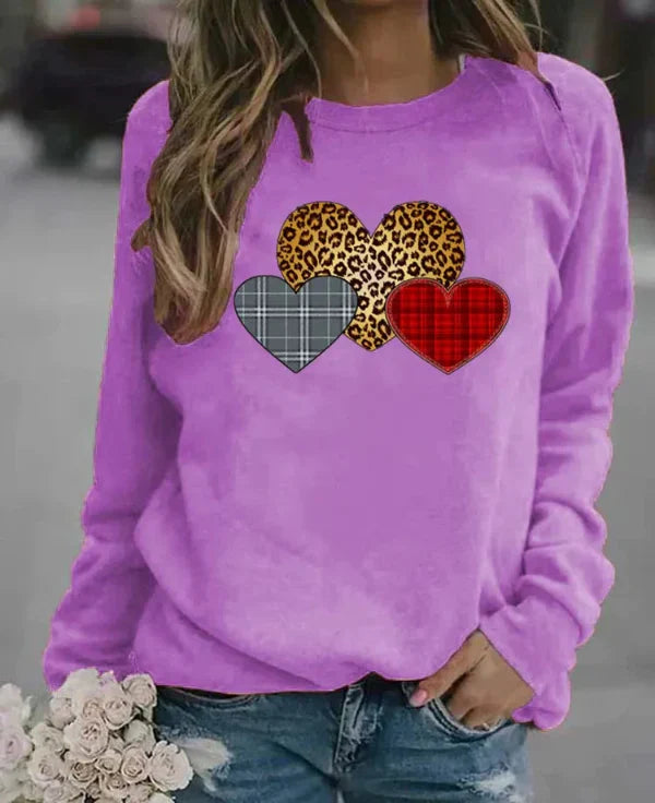 Women's loose fit cotton blend sweatshirt in neutral tone with playful center-front heart graphic print