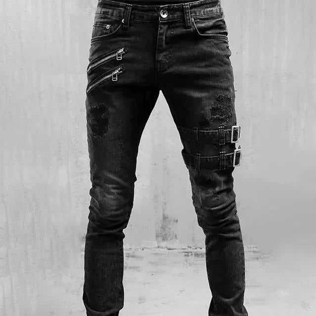 Men's slim fit distressed denim jeans with gothic buckle accents and zipper detail edgy style