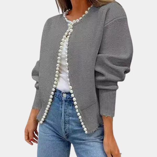 Women's relaxed fit soft knit cardigan with pearl buttons and long sleeves for modern layering