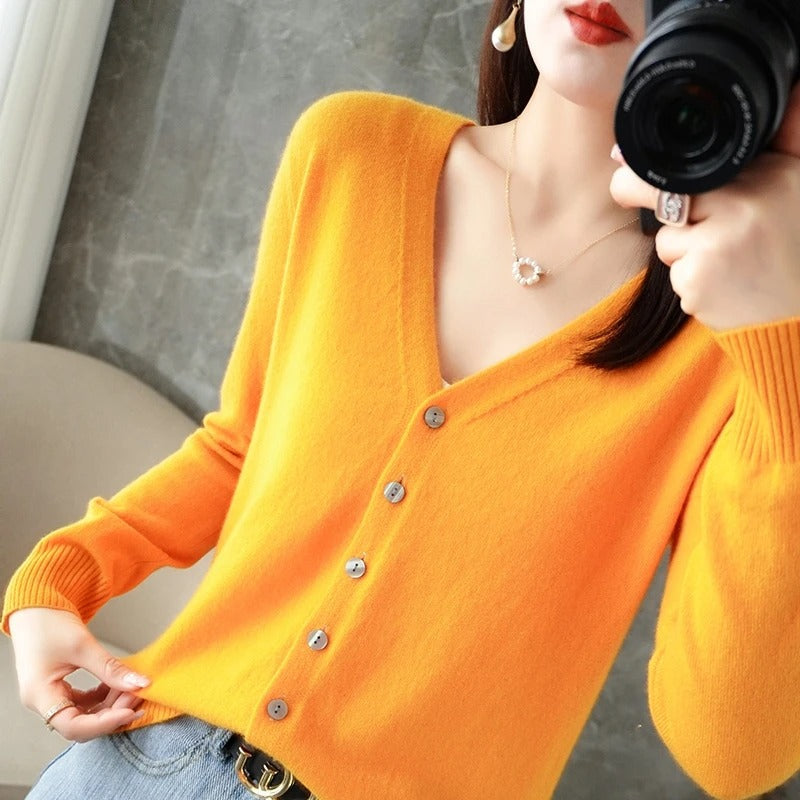 Women's wool blend relaxed fit V-neck cardigan with button front closure and ribbed trim detailing