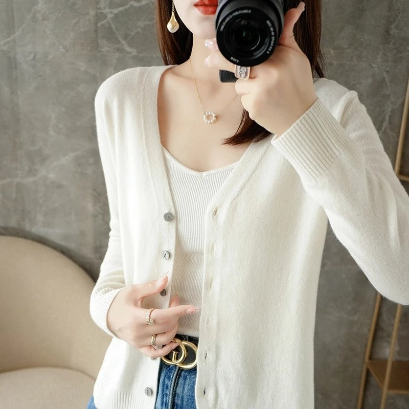 Women's wool blend relaxed fit V-neck cardigan with button front closure and ribbed trim detailing