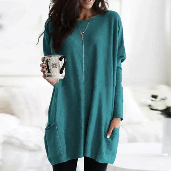 Women's oversized soft knit tunic pullover with dropped shoulders and convenient side pockets