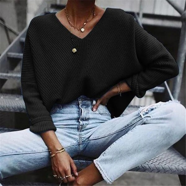 Women's oversized chunky rib knit sweater V-neck wide sleeves cozy fall winter essential