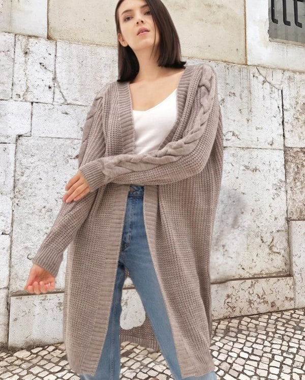 Women's oversized long open-front knit coat with cable knit sleeves, cozy layering essential