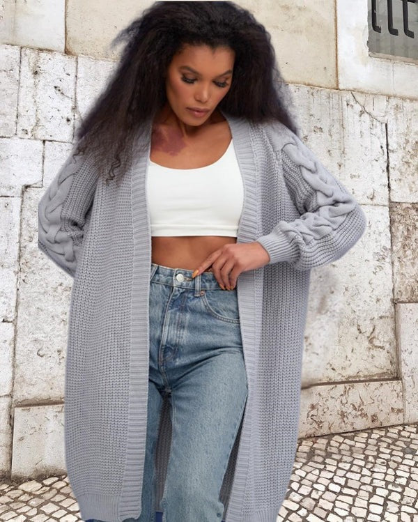 Women's oversized open-front knit coat with cable knit sleeves, long cozy layering style