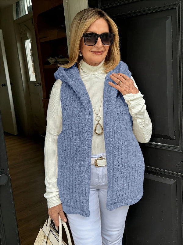 Women's fuzzy knit hooded vest sleeveless relaxed silhouette cozy acrylic blend layering essential