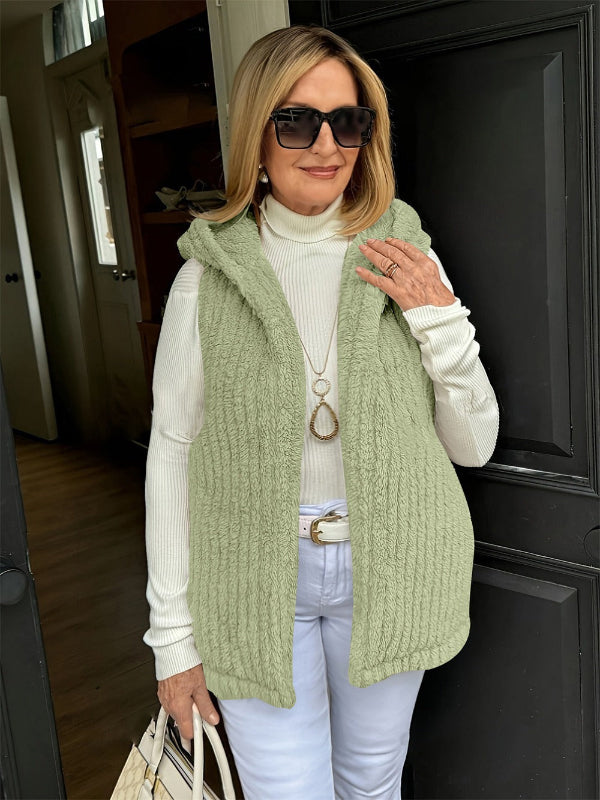 Women's fuzzy knit hooded vest sleeveless relaxed silhouette warm lightweight layering essential