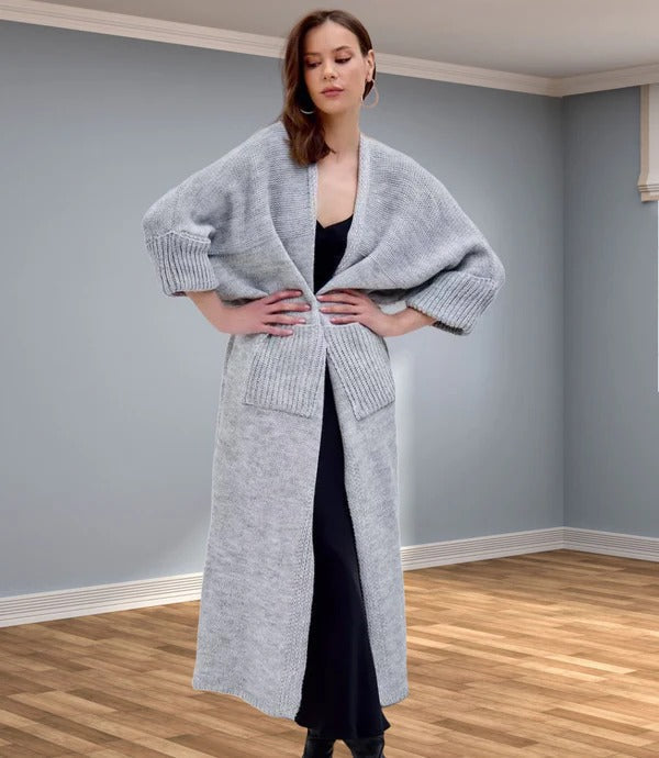 Women's oversized knit coat V-neck silhouette with side pockets, cozy fiber blend for effortless layering