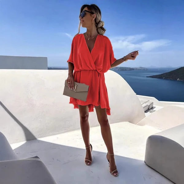 Women's wrap dress deep V-neck cinched waist flutter hem lightweight summer style