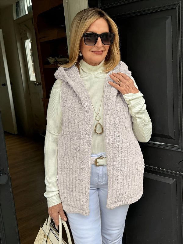 Women's fuzzy knit hooded vest sleeveless cozy layering piece warm relaxed fit casual style