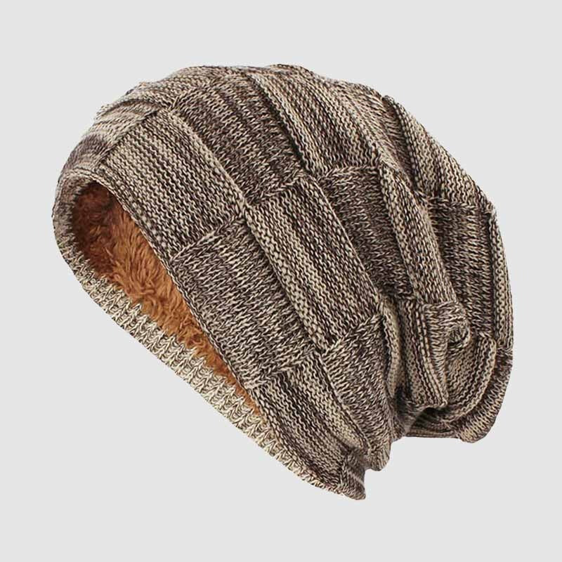 Dark ribbed knit urban beanie with plush fleece interior, minimalist style for cold weather commuters