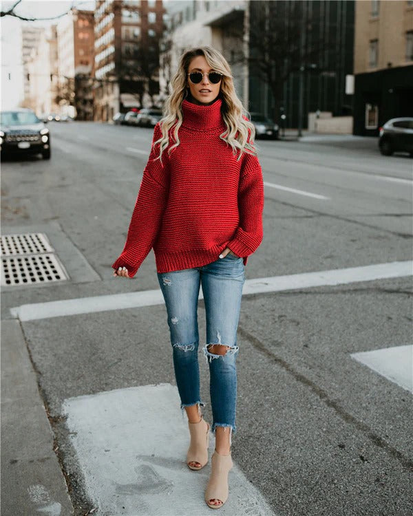 Women's oversized knit turtleneck sweater in cozy ribbed texture with long sleeves for relaxed fall style