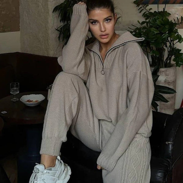Women's oversized quarter-zip knit two-piece loungewear set in soft neutral tones with cozy silhouette