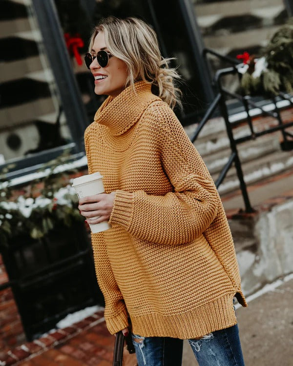 Women's oversized knit turtleneck sweater in cozy ribbed texture with long sleeves for relaxed fall style