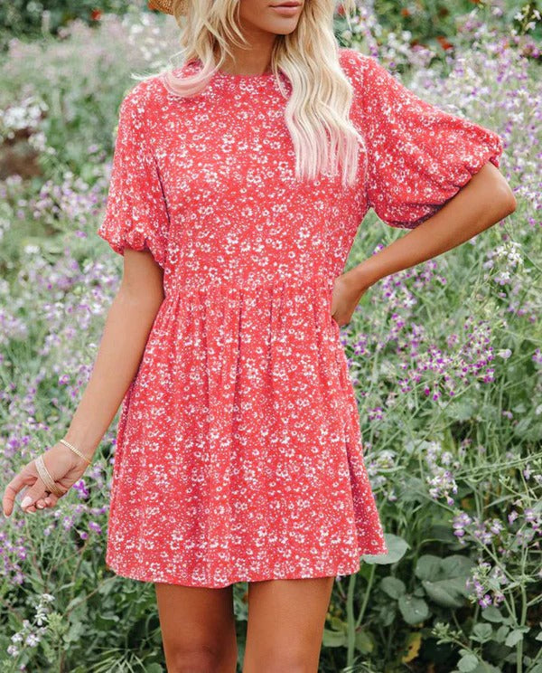 Women's floral A-line mini dress with romantic puff sleeves, breezy casual vacation style