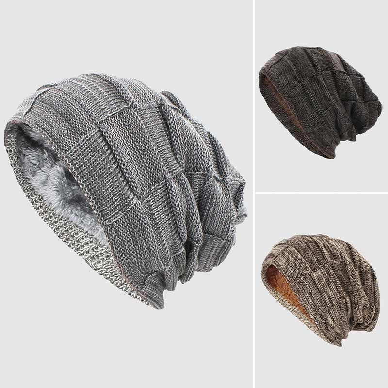 Dark ribbed knit urban beanie with plush fleece interior, minimalist style for cold weather commuters