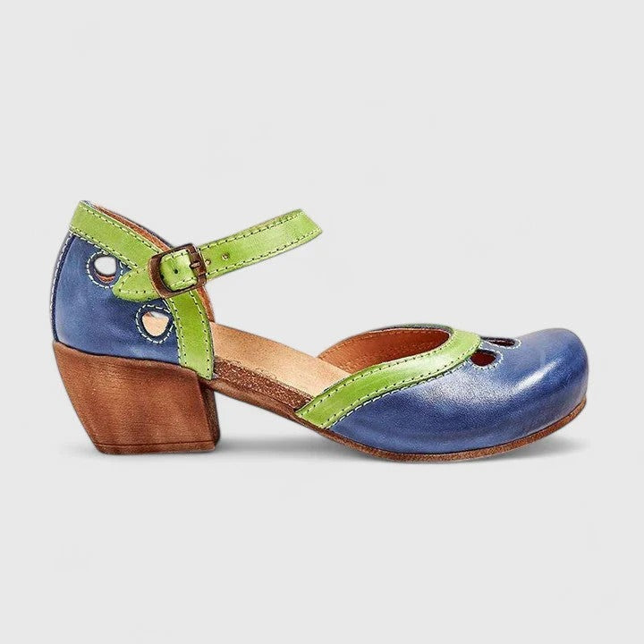 Women's black Mary Jane shoes rounded toe buckle strap cutout details timeless elegant comfort