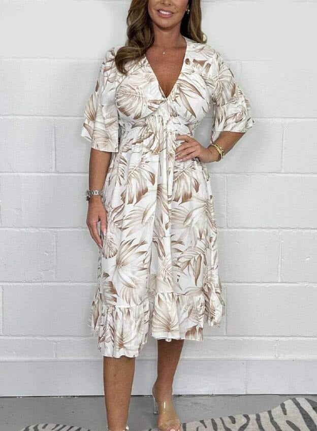Floral midi dress for women with V-neck, high waist, ruffle sleeves, and loose feminine silhouette