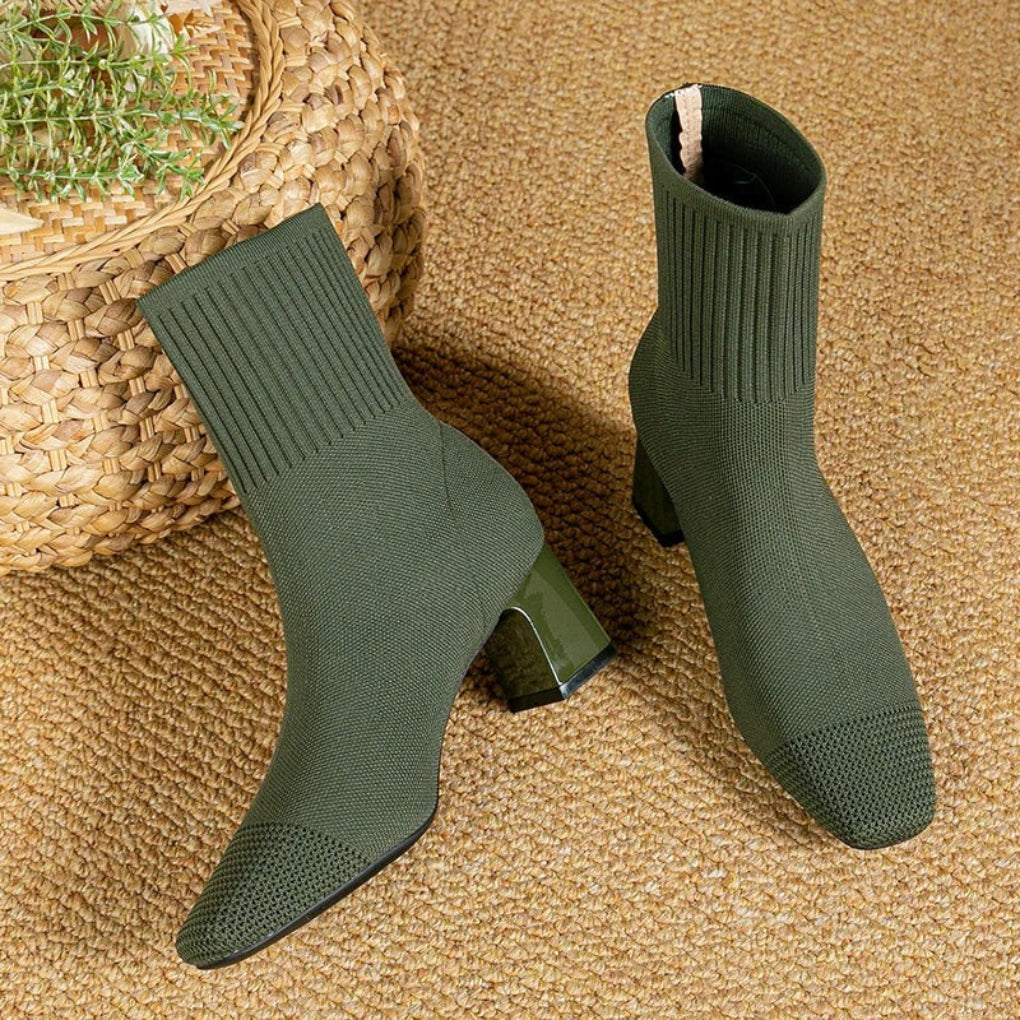 Women's ribbed knit ankle boots in neutral tone, cozy insulated winter style with snug flexible fit