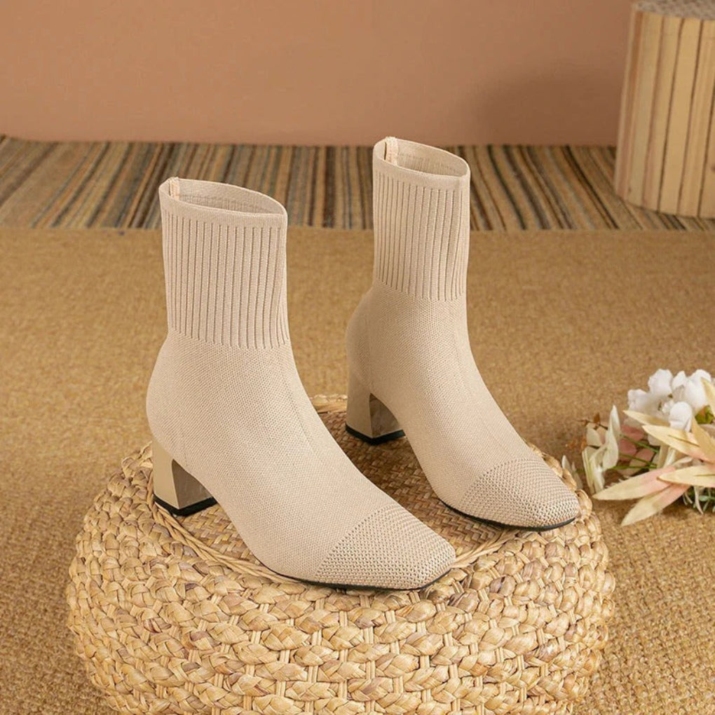 Women's ribbed knit ankle boots in cozy winter style with snug fit and textured flexible design