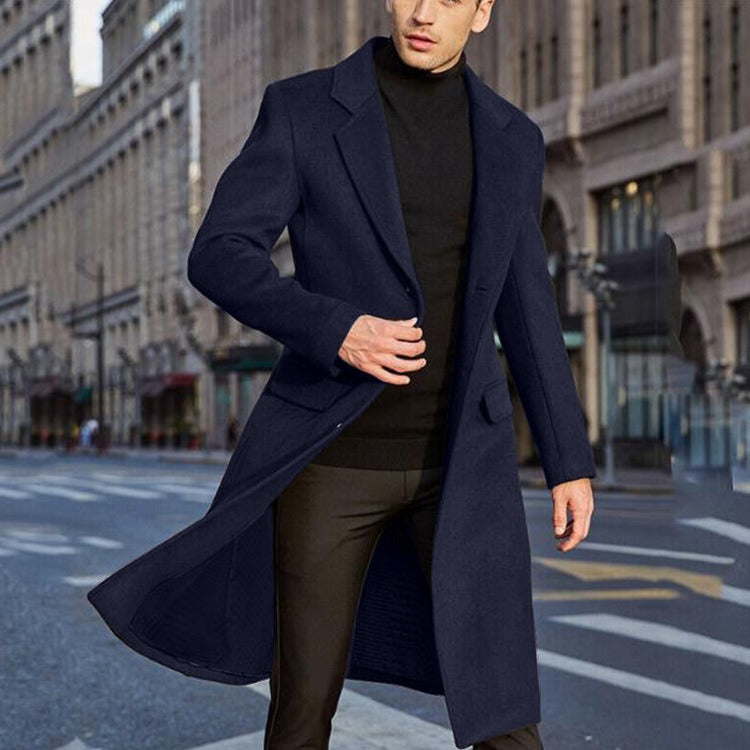 Men's tailored wool-blend long trench coat with wide lapel and hidden buttons, modern Nordic style