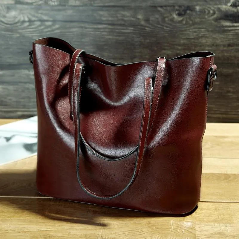 Women's vintage PU leather tote bag in classic tones, wrinkle-resistant with retro charm for daily use