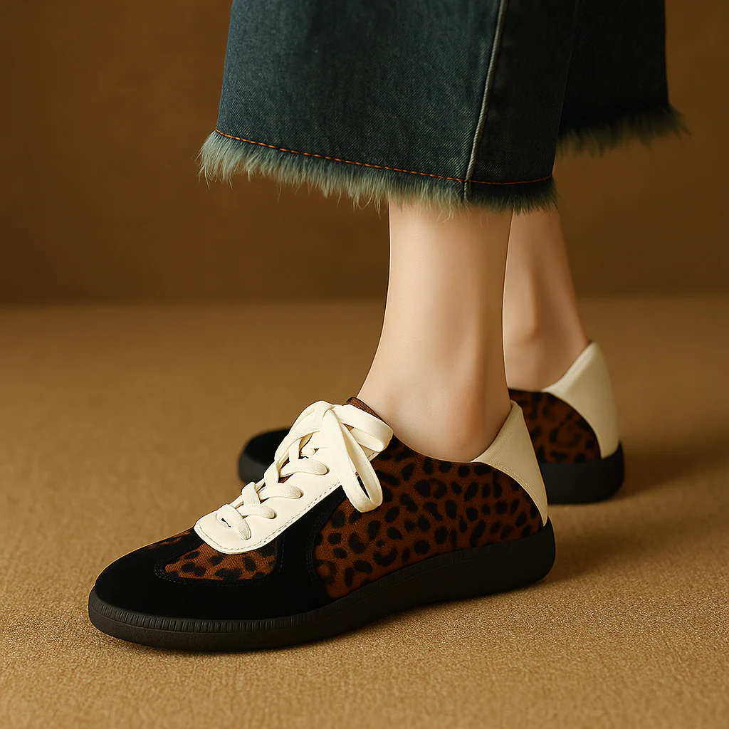 Women's white genuine leather sneakers low-top silhouette with clean minimal stitching detailing