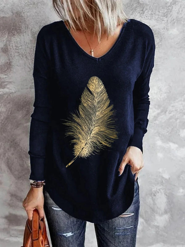 Women's relaxed fit soft knit V-neck pullover sweater with elegant feather accent detail