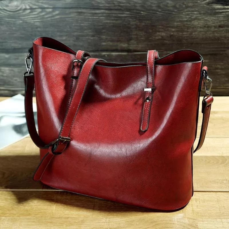 Women's vintage PU leather tote bag in classic brown, wrinkle-resistant exterior for everyday use