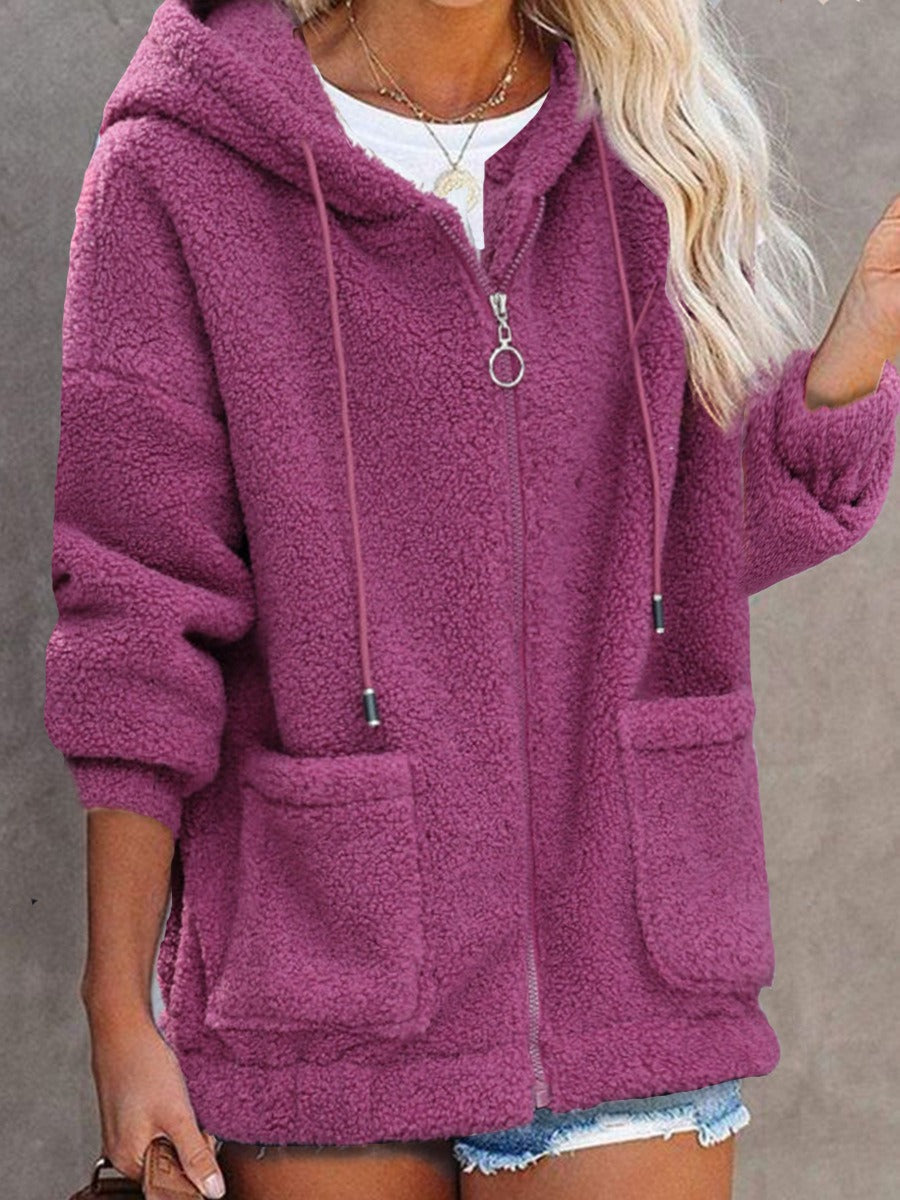 Women's oversized sherpa hooded jacket with zip front, cozy plush texture and front pockets
