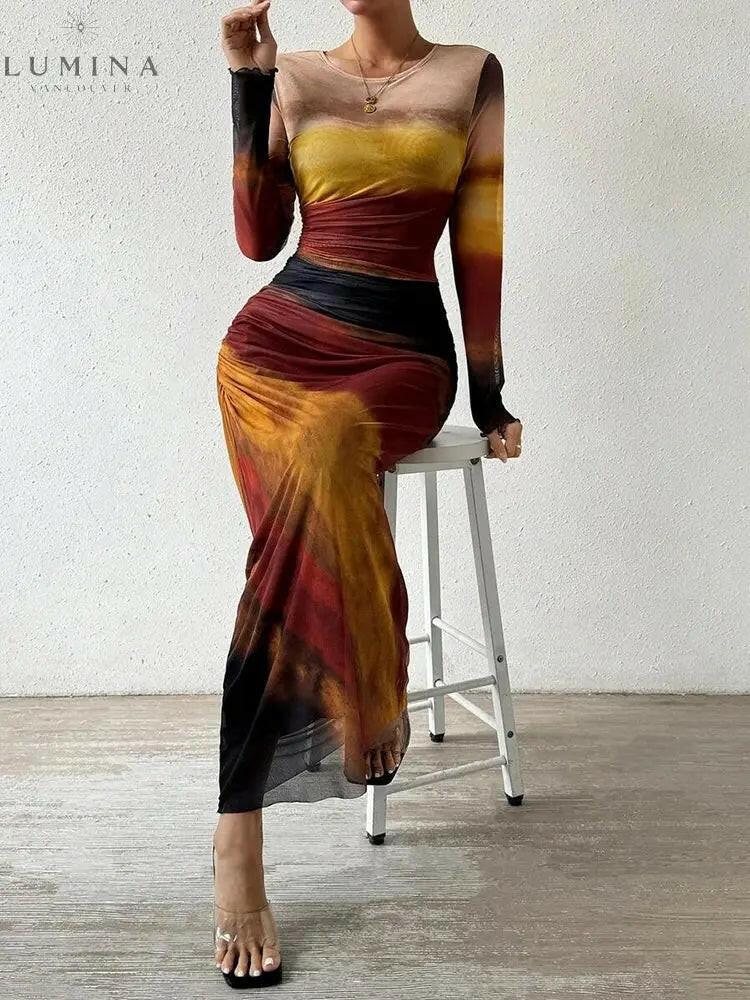 Inara Dream maxi dress gradient print warm hues body-hugging ruched elegant silhouette