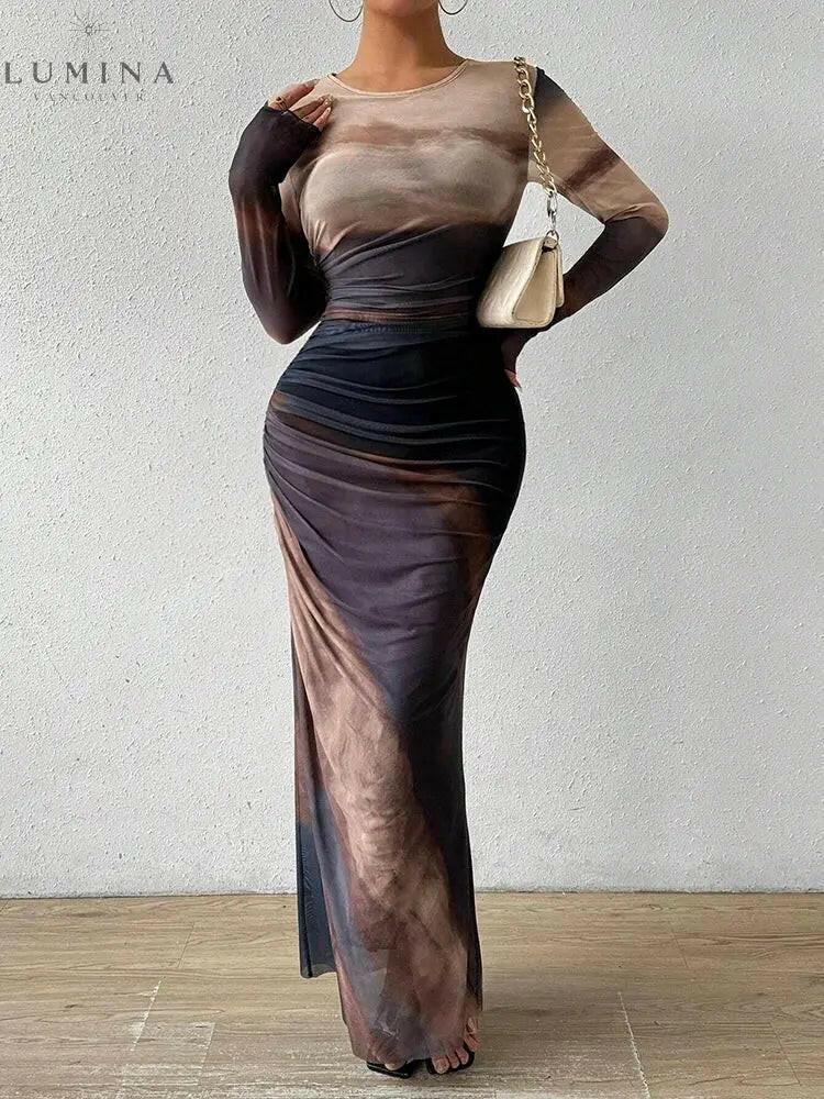 Inara Dream maxi dress gradient print warm hues body-hugging ruched silhouette elegant evening gown