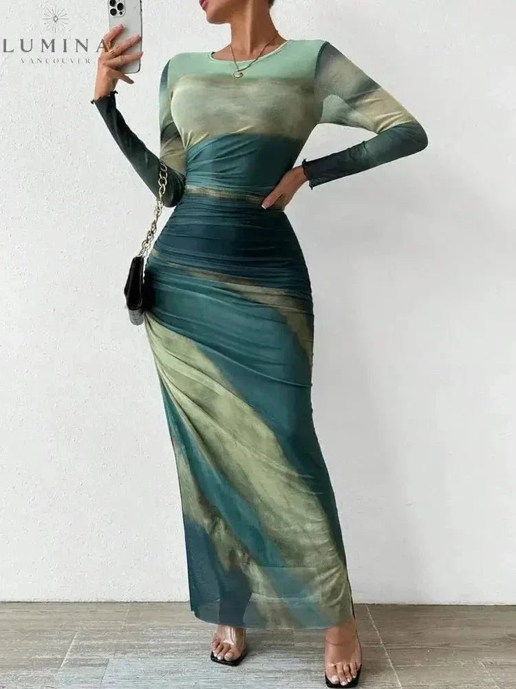 Inara Dream maxi dress gradient print warm fiery hues body-hugging ruched elegant silhouette