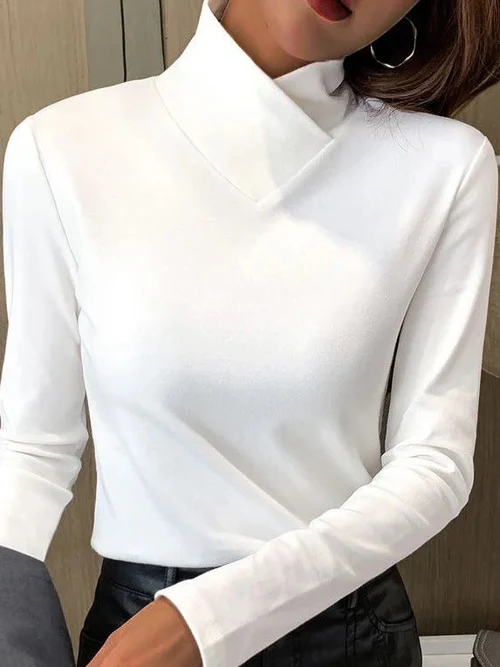 Women's white minimalist asymmetrical neck top with elegant V-detail collar and modern silhouette