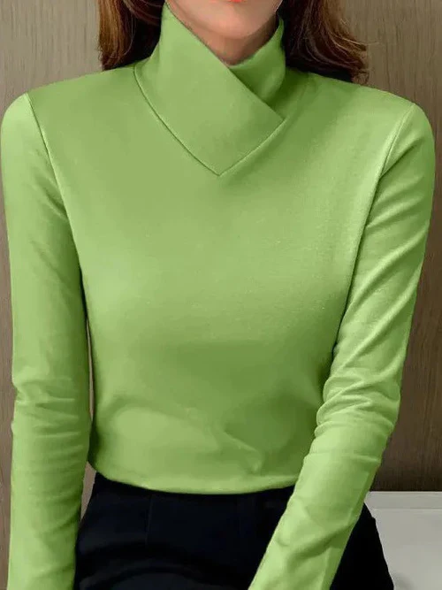 Women's white minimalist top with asymmetrical V-neck collar and elegant twisted detail