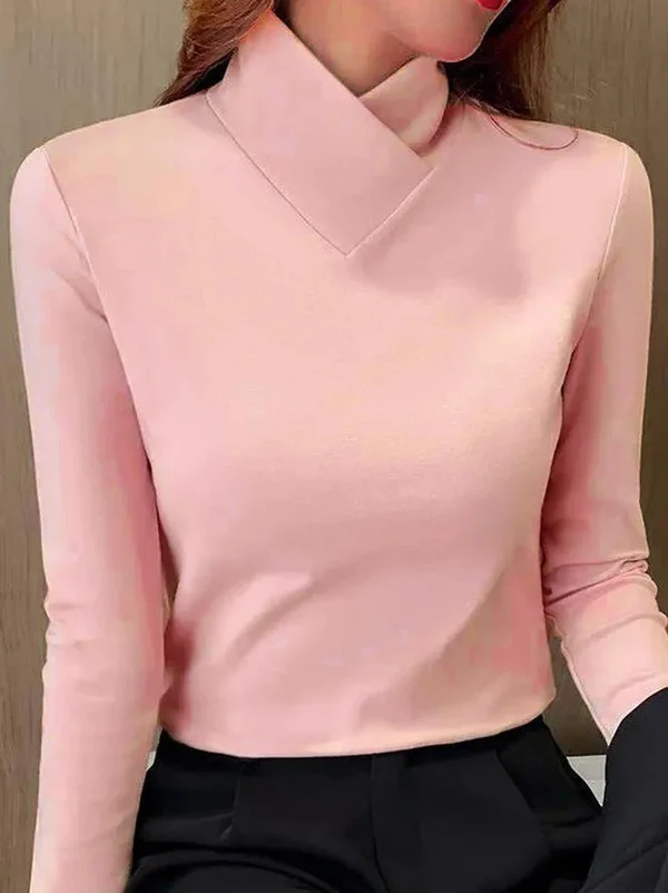 Women's white asymmetrical neck top with elegant V-detail collar and minimalist slim-fit silhouette