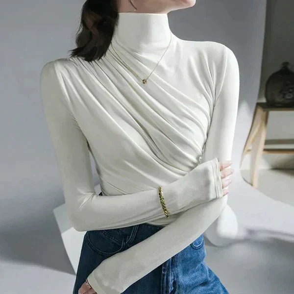 Women's white pleated turtleneck blouse elegant tailored fit with graceful draped silhouette