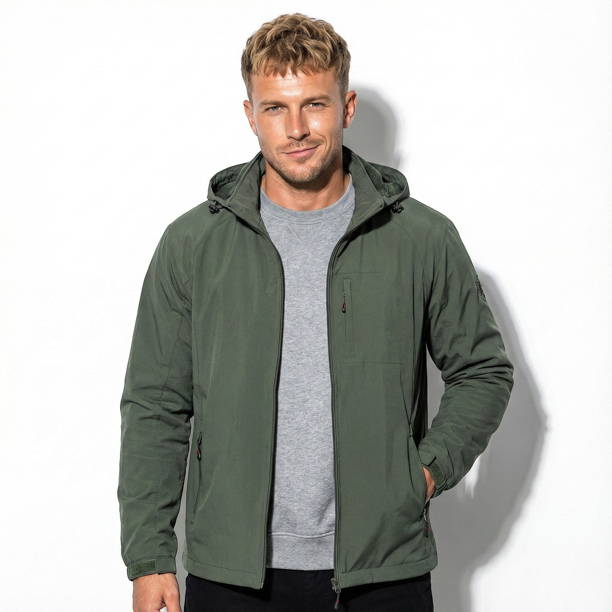 Men's lightweight waterproof cargo jacket in neutral tone with breathable fabric and multi-pocket design