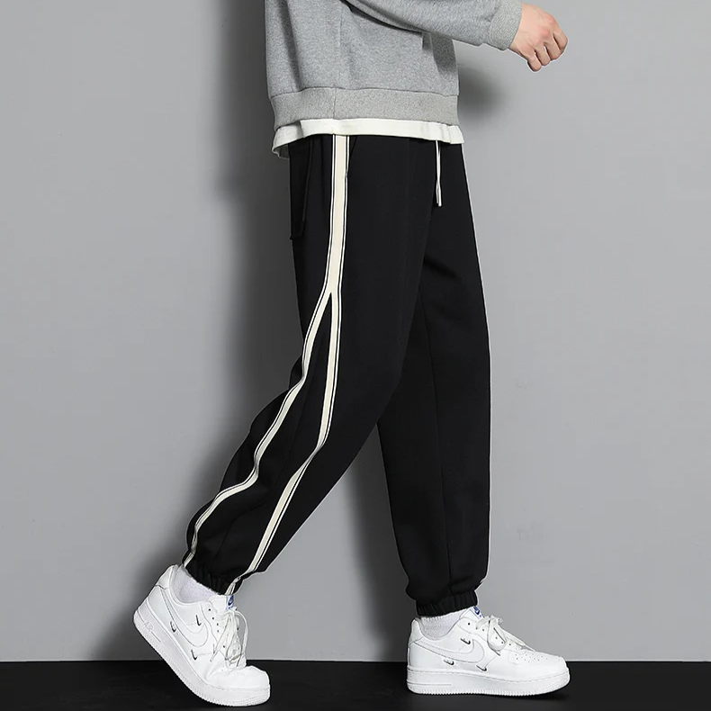 Horizon striped wool-blend jogger in neutral tones, slim silhouette with ultra-soft premium fabric